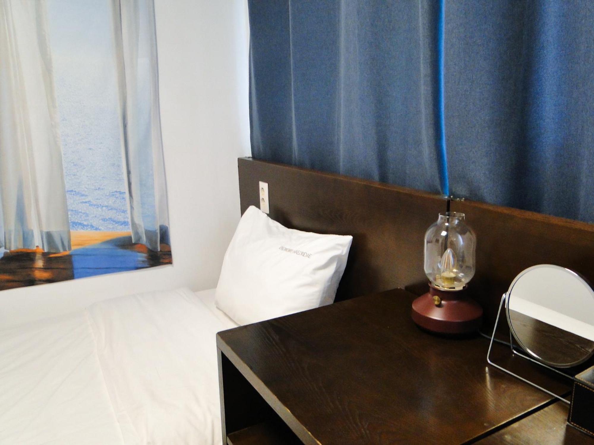 Ekonomy Haeundae Hostel Busan Bagian luar foto