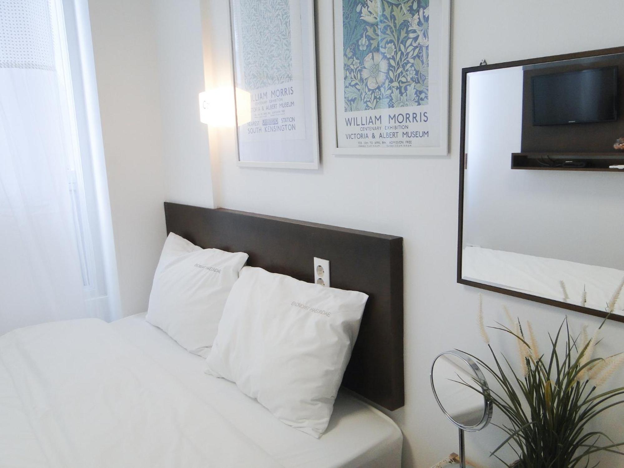 Ekonomy Haeundae Hostel Busan Bagian luar foto